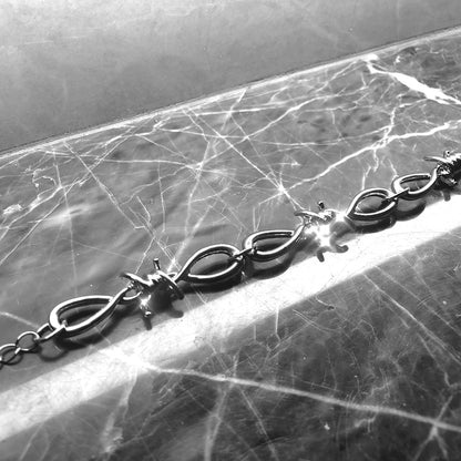 Dark Wind Metal Thorns - Velvet Vista